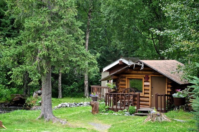 Two cabins by the creek.