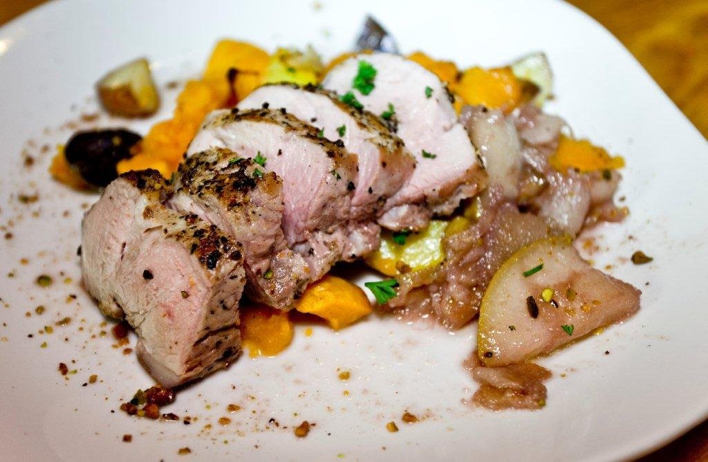 Pork Tenderloin over butternut squash and red potatoes.