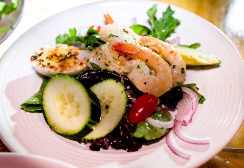 Mixed fresh greens salad with shrimp.