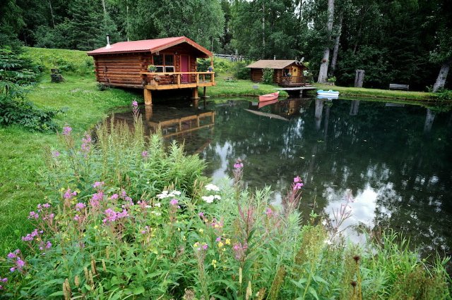 Two of our cabins on the pond.